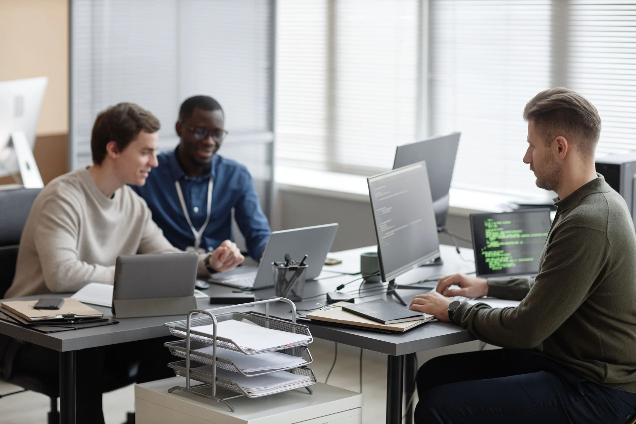 Technology professionals working in an office